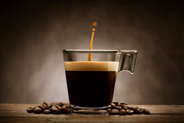 coffee cup - cup of coffee beans imagens e fotografias de stock