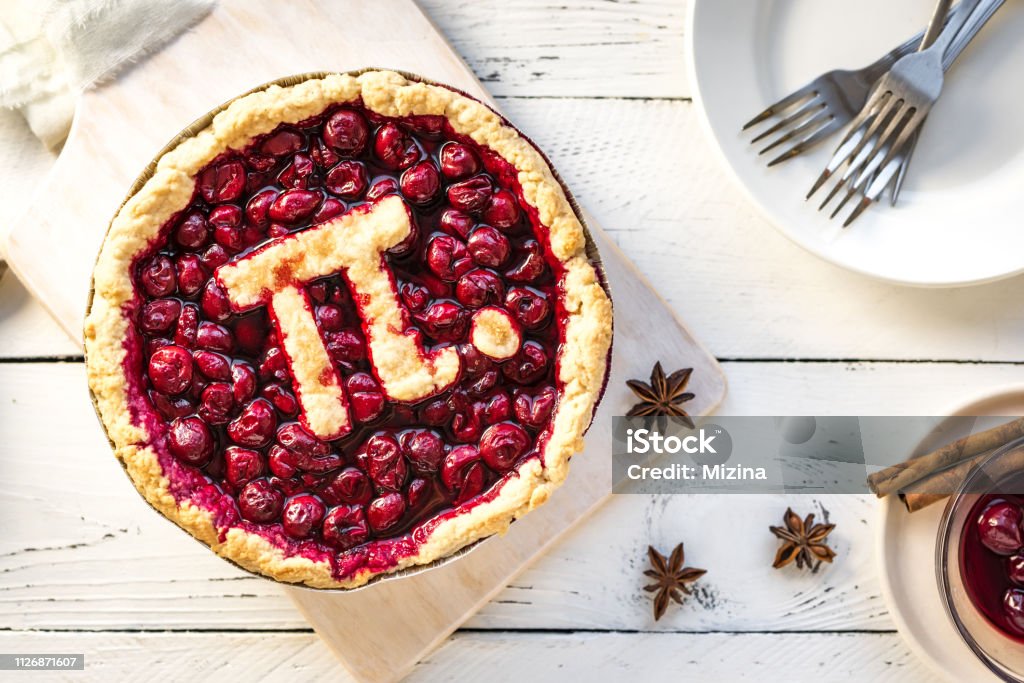 Pi Day Cherry Pie Pi Day Cherry Pie - Homemade Traditional Cherry Pie with Pi sign for March 14th holiday. Sweet Pie Stock Photo