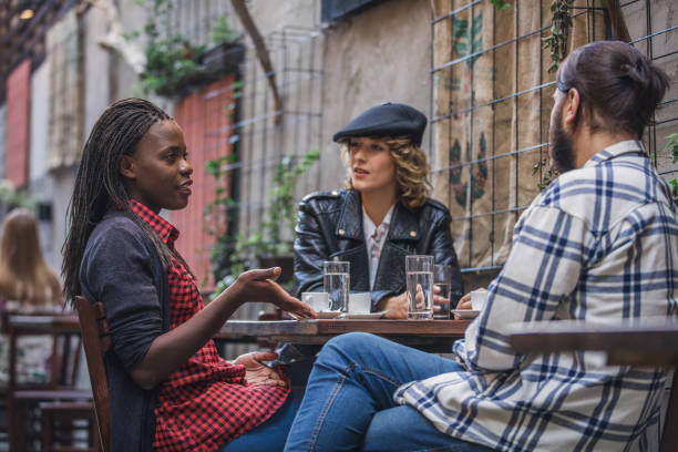 istock Friends relaxing in coffee shop 1126872958