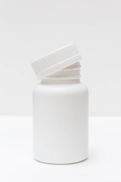 istock clean plastic white bottle for pills and medicine 1126875978