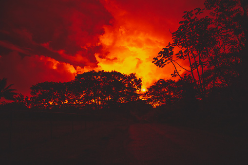 The night sky glowing red from the Kilauea lava flow.