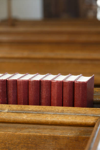 Ludwigsburg, Germany - March 8, 2015: The church choir The Voices Of Peace perform during the worship service in the Friedenskirche - Peace Church - on March 8, 2015 in Ludwigsburg, Germany. A bible in the foreground is displaying Psalm 69 in German language.