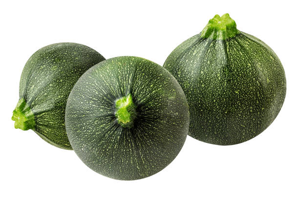 istock Green round zucchini isolated on white background with clipping path 1126876912