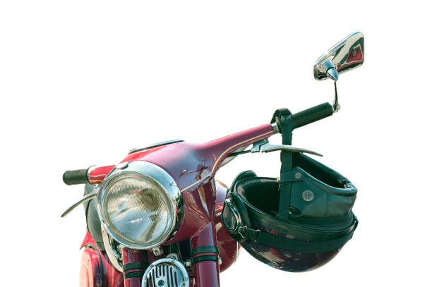 istock old model's motorcycle, red with chrome elements, retro helmet on the steering wheel, isolated on white background 1126878448