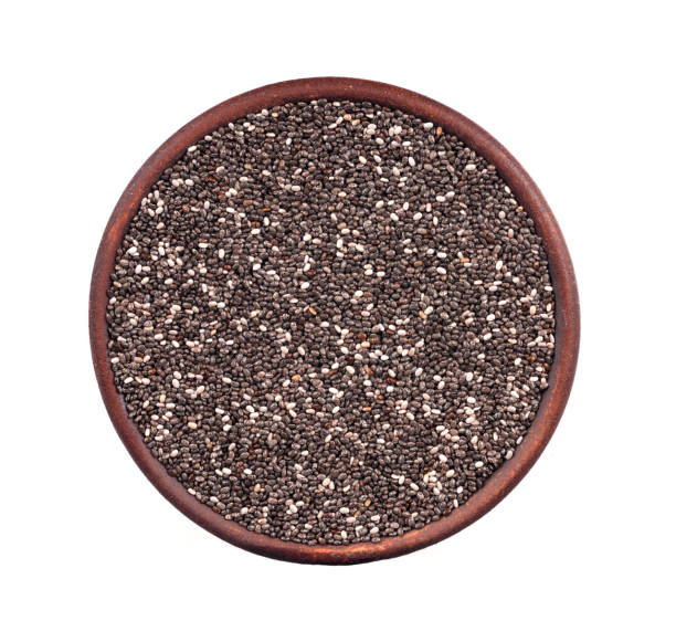 istock chia seeds in a cinnamon clay plate, top view, isolated 1126878566