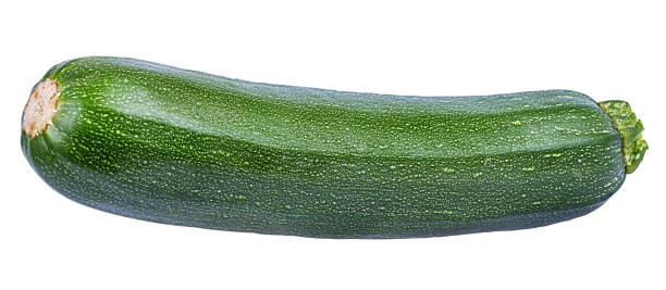 istock Green zucchini isolated on white background with clipping path 1126879501