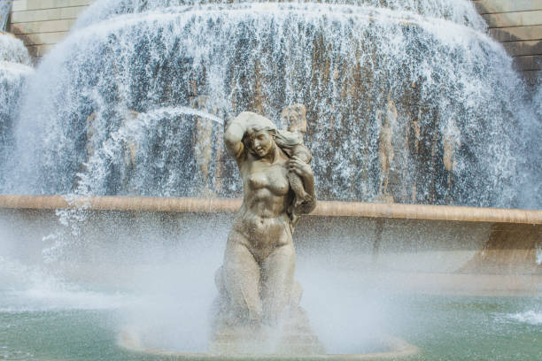 istock a siren with a fish fountain 1126885847