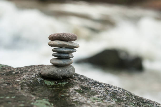 istock stone balance on rock in border river 1126887595