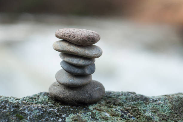 istock stone balance on rock in border river 1126887600