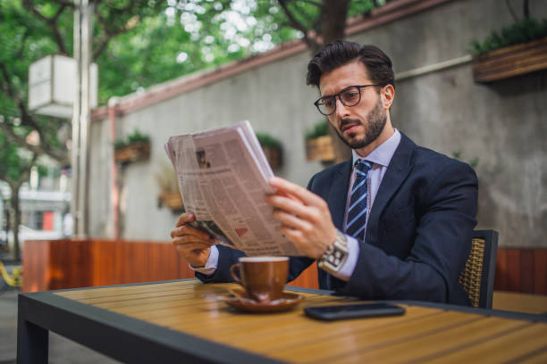istock Businessman in coffee shop 1126891611