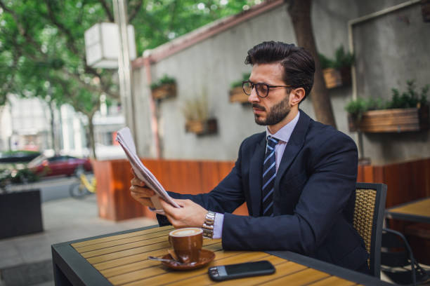istock Businessman in coffee shop 1126892309