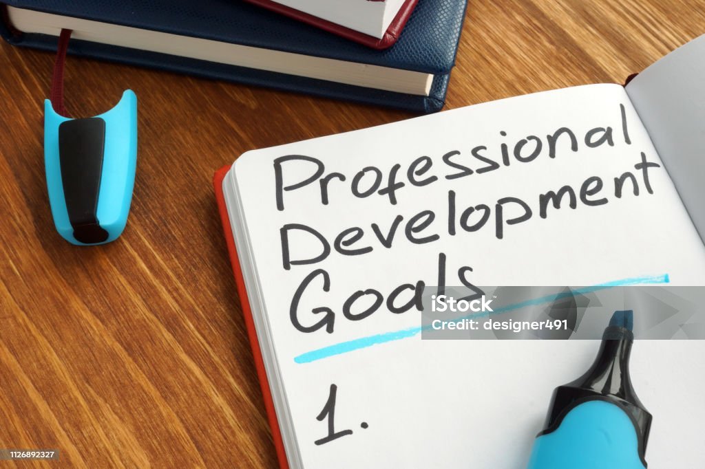 Professional development goals list in a note. Development Stock Photo