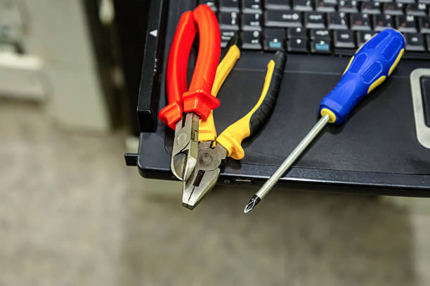 istock technical tool set computer upgrade repair screwdriver cutting pliers on keyboard background design 1126894006