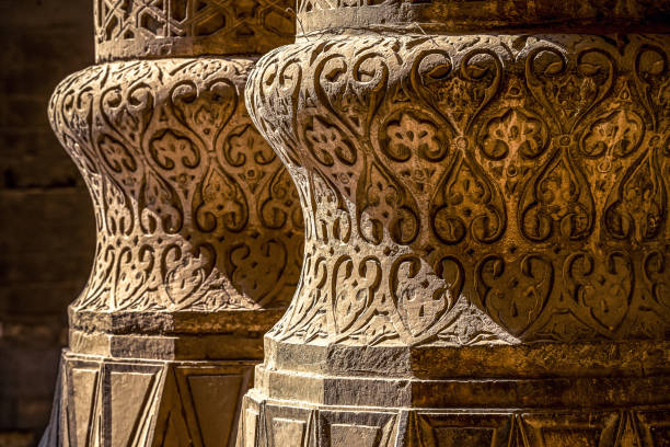istock two incredibly beautiful columns with beautiful patterns on them in the middle of an ancient mosque 1126897394