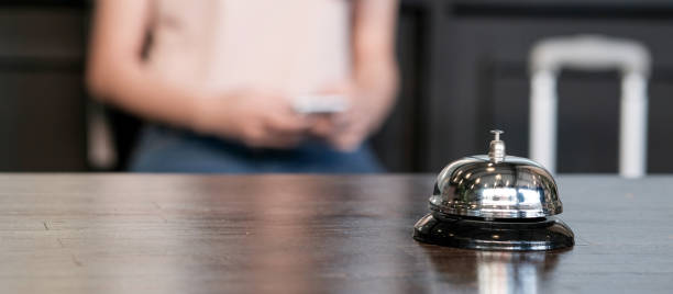 istock Hotel reception counter desk with service bell. 1126898806