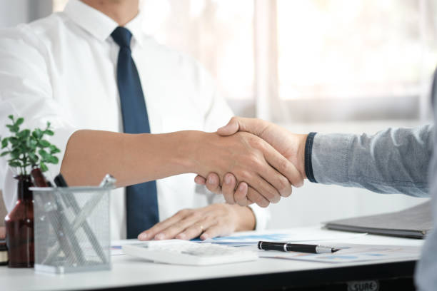 istock Image business mans handshake. Business partnership meeting concept 1126898834