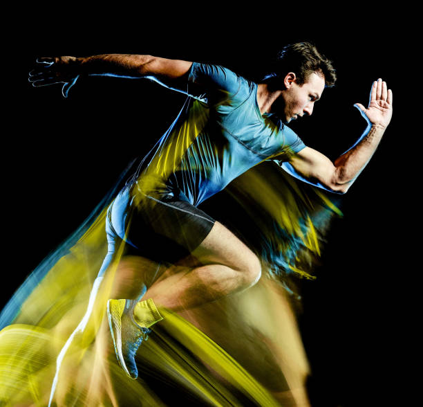 istock runner running jogger jogging man isolated light painting black background 1126899139