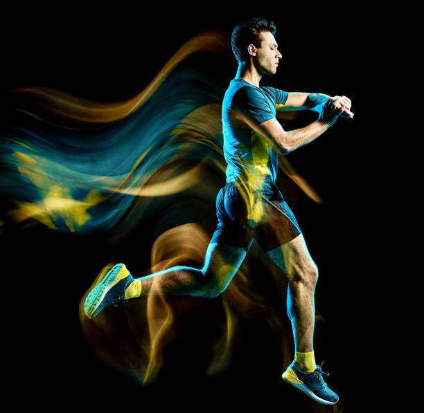 istock runner running jogger jogging man isolated light painting black background 1126899164