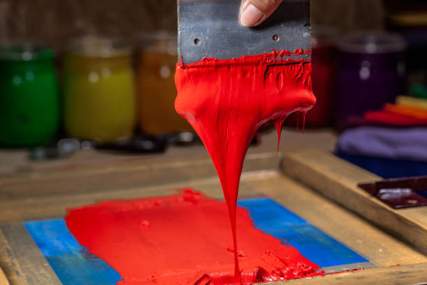 istock red color dripping from hand screen printing 1126905622