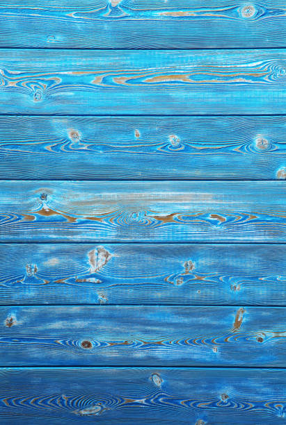 istock Image of bumpy vintage wooden background painted with blue paint 1126909911