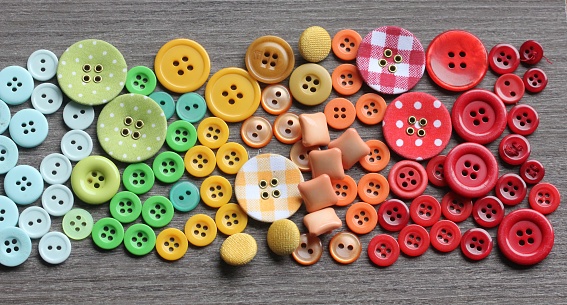 series of buttons placed on a plane, according to chromatic shades