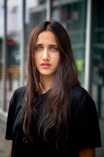 istock Beautiful Olive Skinned Young Woman With Light Colored Eyes 1126912116