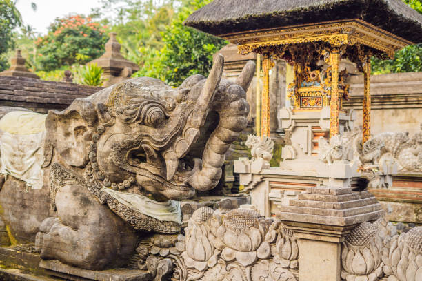 istock Stone balinese mossy statue Bali island Indonesia 1126912396