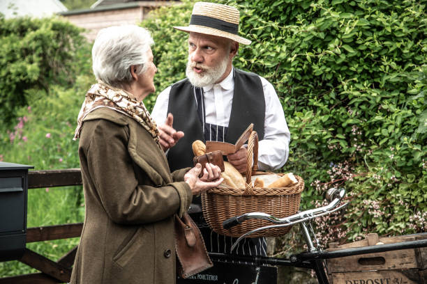 retro style deliveryman with customer - selling bread and meat - ration book/war years