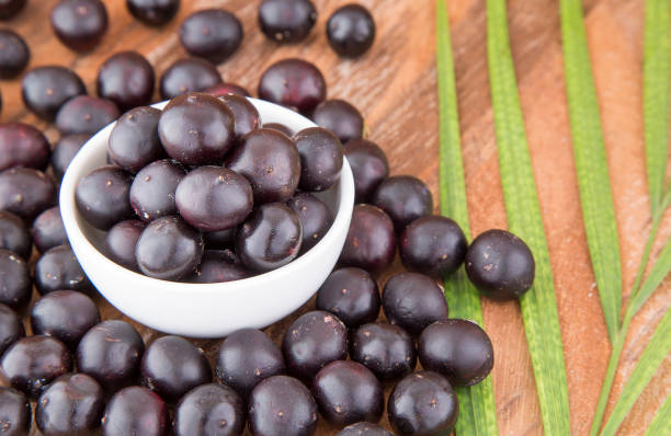 istock Fresh acai berries - Euterpe oleracea 1126918278