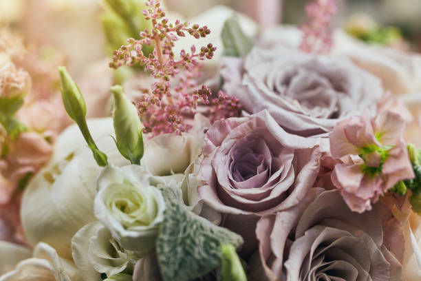 istock beautiful wedding bouquet with roses standing on the table 1126919899