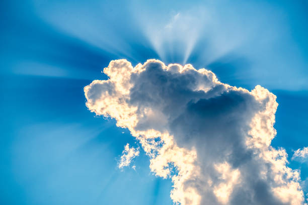 istock incredibly dramatic clouds with the bright rays of the sun that breaks through them 1126920332