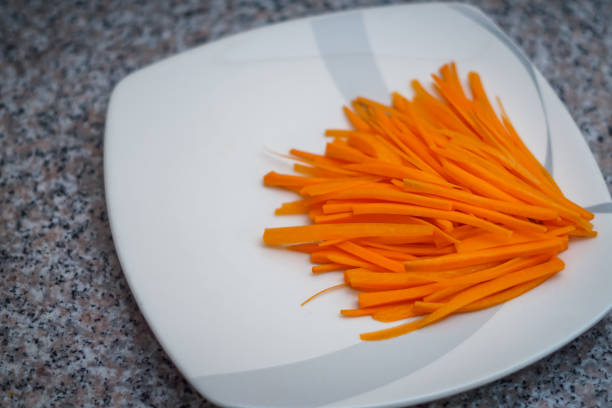 A plate of carrots stock photo