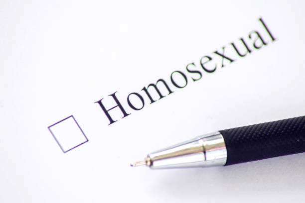 istock Checklist with a word Homosexual on white paper. Checkbox concept. 1126922898