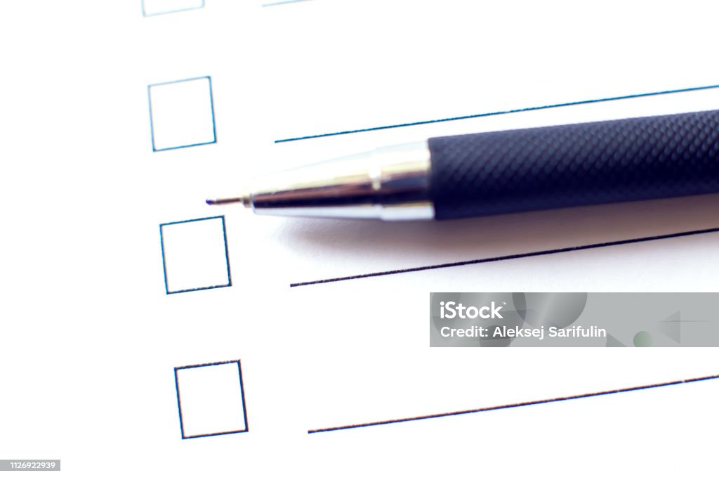 Pen Checkboxes Checklist Form With A Pen On White Paper Checkbox Concept Stock Photo ...