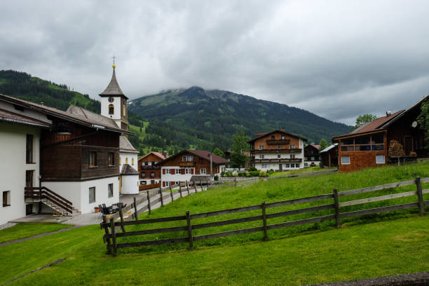 istock a small austrian village with typical houses and a church 1126923184