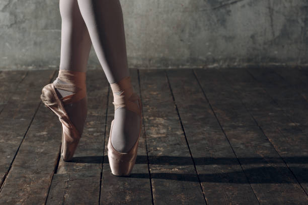 istock Ballert dancer legs in pointe close up 1126924410