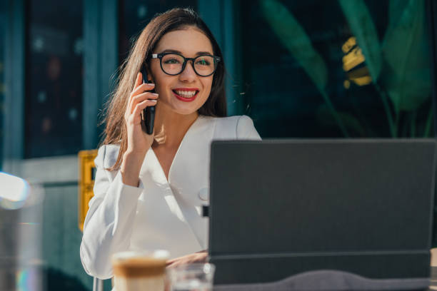 istock Businesswoman talking on mobile phone 1126925614
