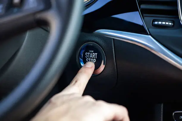 Photo of Engine start and stop button.