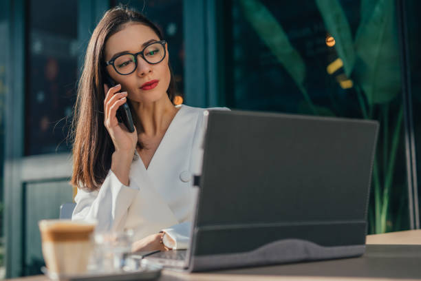 istock Elegant woman having business call 1126926773