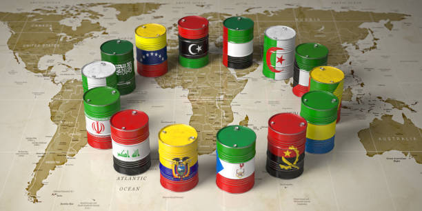 OPEC concept. Oil barrels in color of flags of countries memebers of OPEC on world political map background. OPEC concept. Oil barrels in color of flags of countries memebers of OPEC on world political map background. 3d illustration opec stock pictures, royalty-free photos & images
