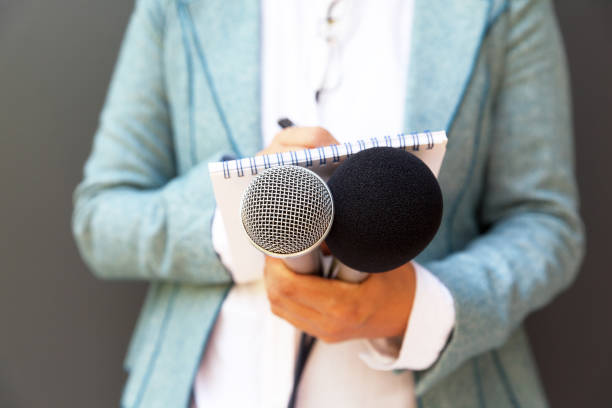 istock Journalist at press or news conference 1126930876