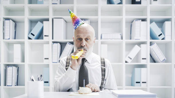 istock Senior businessman having a sad lonely birthday 1126932299