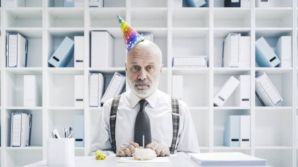 istock Senior businessman having a sad lonely birthday 1126932319