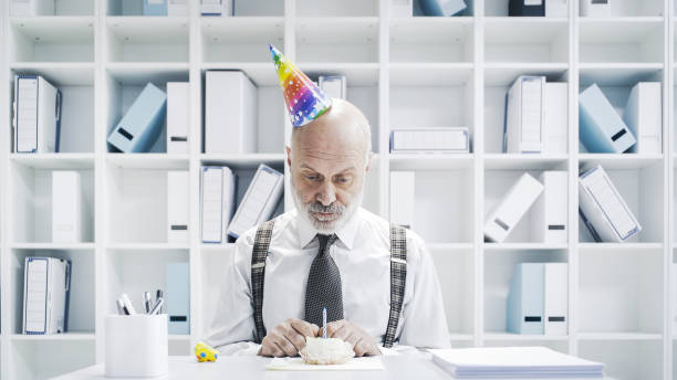 istock Senior businessman having a sad lonely birthday 1126932407