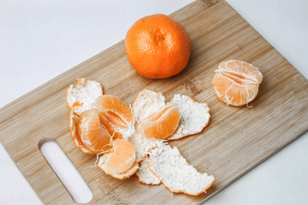 istock Mandarin on a wooden board 1126932641
