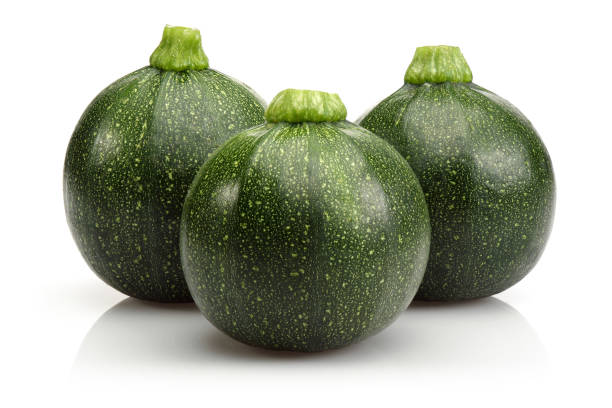 istock Green whole round zucchini on white background 1126934090