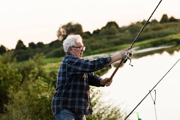 istock Senior man fishing 1126934250
