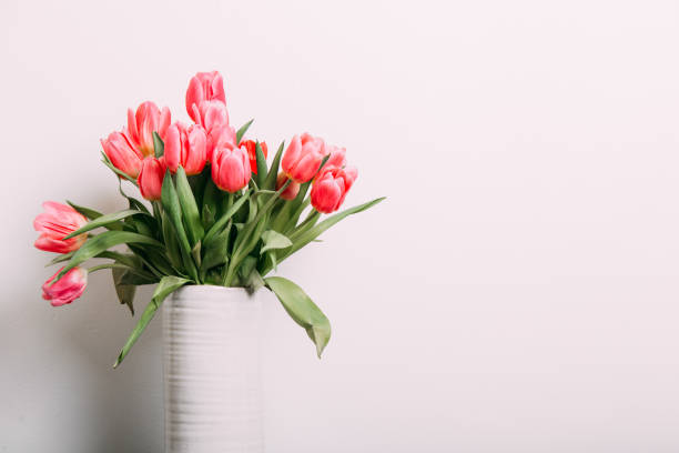 Colorful tulips easter decoration in a home. Spring concept stock photo
