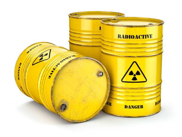 barrels with radioactive waste isolated on white, manufacturing of nuclear power and utilization of radioctive materials. - toxic waste toxic substance drum barrel imagens e fotografias de stock