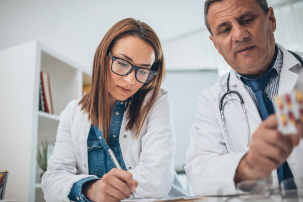 istock Doctor holding pills in hand 1126936604